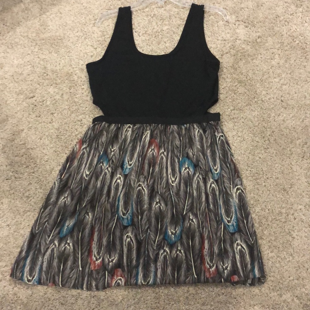 Black dress with a feather like pattern